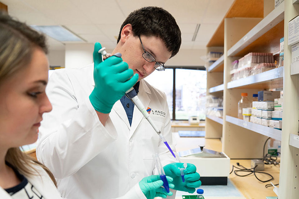 Landos Biopharma scientists working in lab